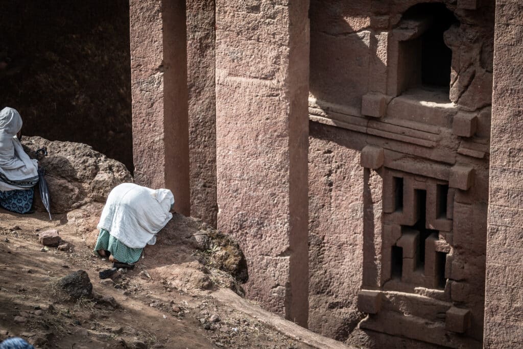 Pilgrim bowing in Lalibela